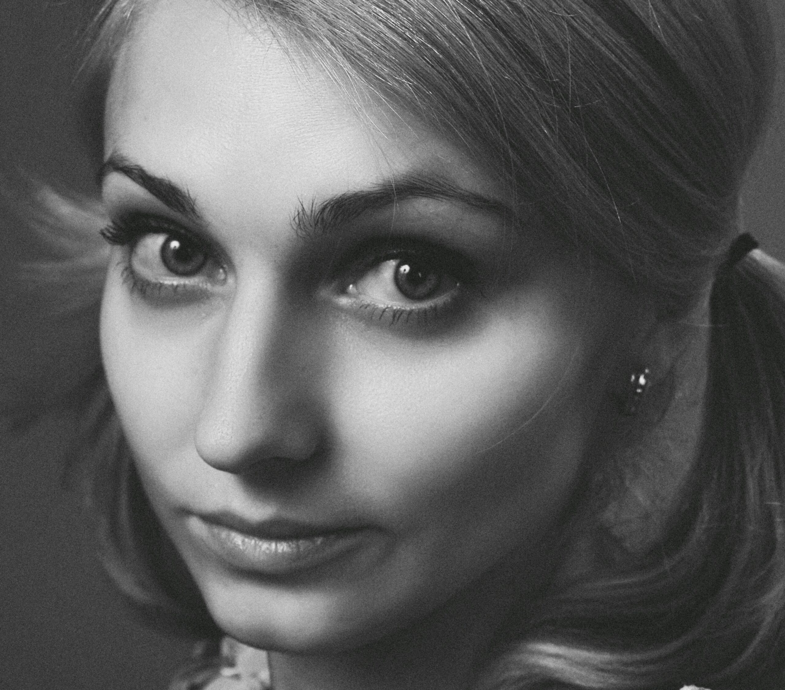 Black and white portrait capturing a woman